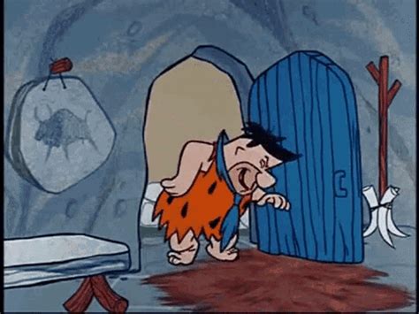 fred flintstone feet gif